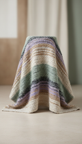 Textured wool throw with fringed edge